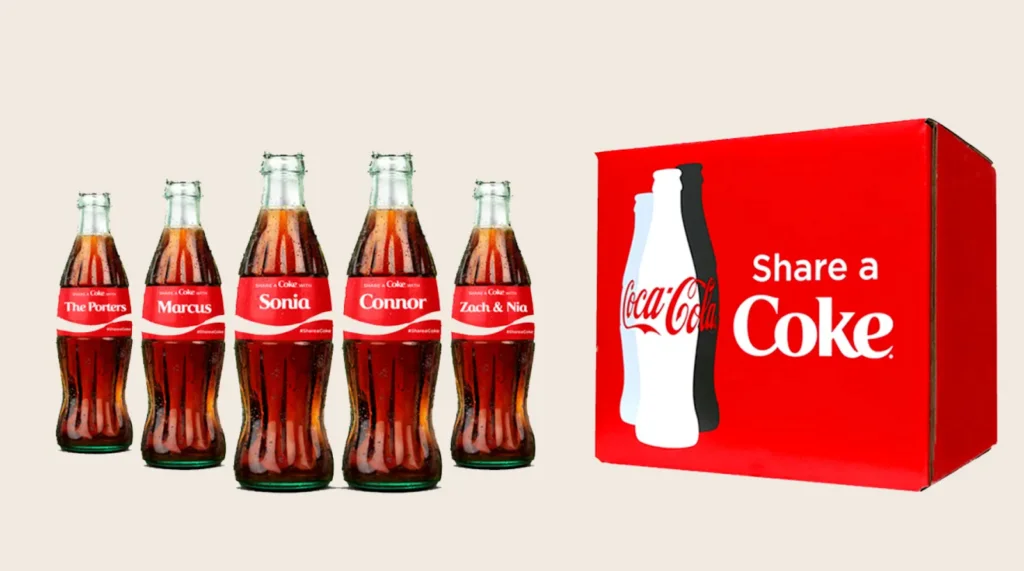 5 CocaCola bottles with peoples names on it